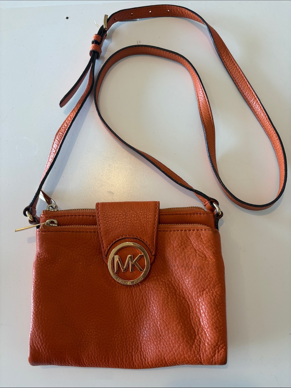 Michael Kors Orange Pebbled Leather Crossbody with Gold MK Logo